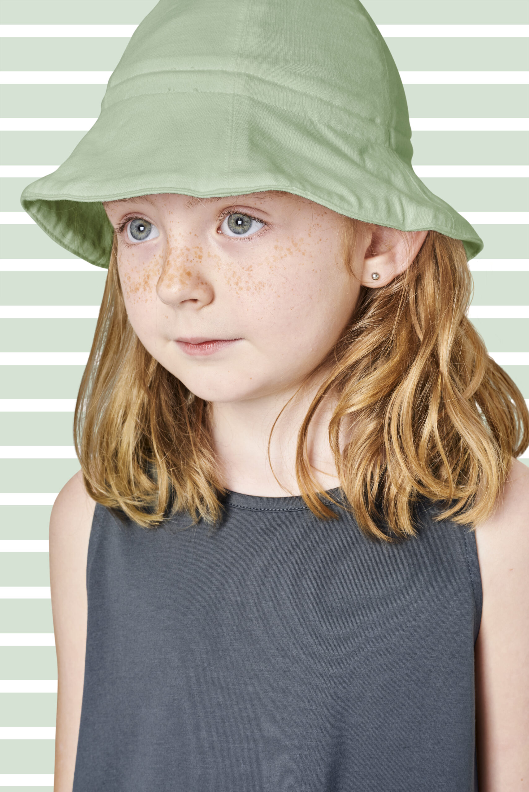 Girl wearing tank top and bucket hat